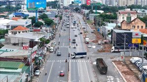 bán nhà mặt tiền đường lớn, đối diện chợ thông dụng