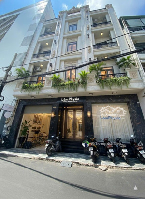 toà nhà mặt tiền huỳnh văn bánh, phú nhuận; 250m2 (7.5 x 35); 5 tầng; hđt 170 triệu - bán 55 tỷ