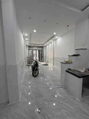 nhà mới 100% hẻm 3.5m lạc long quân, 3.5 x 15m, nh 4.5, 2 tầng + lửng, 3pn 4wc, giá 14.9tr