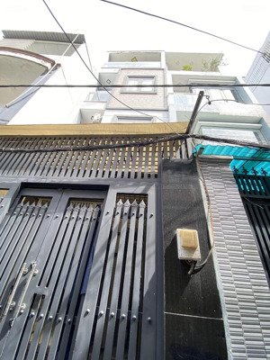 nhà hxh tạ quang bửu, dt 4x20 4tầng shr giá 8tỷ500 tl.