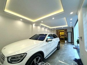 nhà 7 tầng thang máy, ôtô thông tránh kinh doanh, oto 7 chỗ vào nhà. dt 33m2 ngay phố trạm 10,5 tỷ