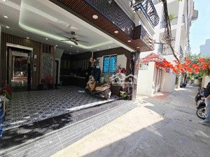 lô góc 2 mặt ngõ - nhà mới 6 tầng thang máy - ô tô vào nhà - ngõ thông - sổ đỏ nở hậu