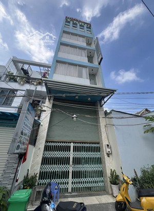 khách sạn 5 tầng - 15 phòng - dt 150tr/th - hxh nguyễn thị thập, q7 - chỉ 13. x tỷ