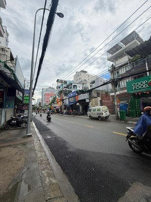 bán nhà mặt tiền nguyễn thượng hiền-lê quang định(5.7x15m)xây mới hầm 5 tầng kd sầm uất chỉ 13.5 tỷ