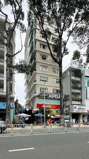 bán toà nhà mt trần hưng đạo quận 5 - dt 9 x 27m - hầm - 10 tầng - hđt 600 triệu - giá 240 tỷ