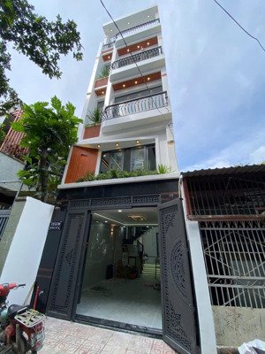 nhà phố hiện đại mới xây, có gara xe hơi, khu dân cư hiện hữu giá cực rẻ , có hỗ trợ vay nh.