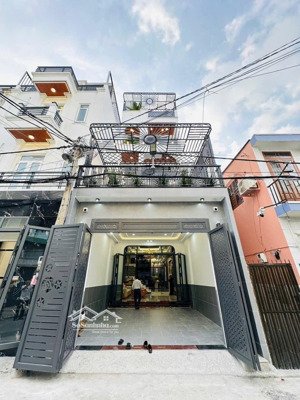 siêu phẩm thang máy cao cấp dt khủng . 5m x 25m -4 lầu - hẻm thông 10m tiện kd. sát hà huy giáp.