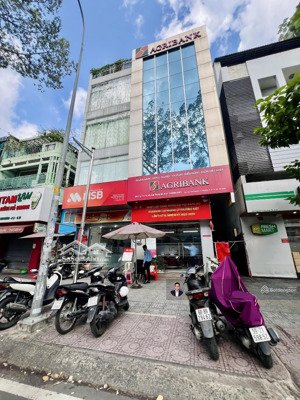 bán tòa nhà mặt tiền trần hưng đạo, chợ hòa bình - 6.5x23m - hầm 6 tầng - hđt 180 tr/th - giá 66 tỷ