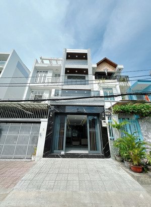 nhà phố 4 tầng có thang máy,gara oto-đường số tân quy, quận 7 -giá 18.x tỷ