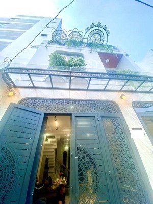 nhà mới : bùi quang là p.12 q.gv ( 5.4 x 11 / 2 lầu đúc )