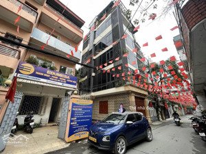 (sốc hạ 2tỷ) 22.5tỷ giảng võ (lô góc) 50m2, oto tránh, mt4.5m, 7t thang máy,kd văn phòng, gần phố