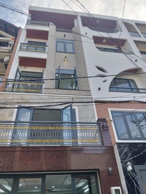 bán nhà hẻm thông xe tải chánh nhau,giáp tân phú, quận 6, có thang máy 450 kg, ô tô đậu trong nhà