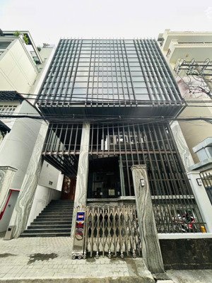 tòa nhà văn phòng đường nguyễn văn trỗi, phường 15. dt: 14x28m. hầm - 7 tầng. pccc đầy đủ