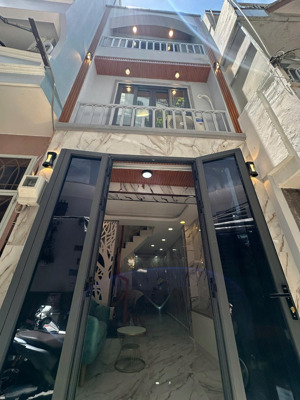 bán nhà đẹp full nội thất + hẻm xe hơi rộng đường trần bình trọng p1 q5