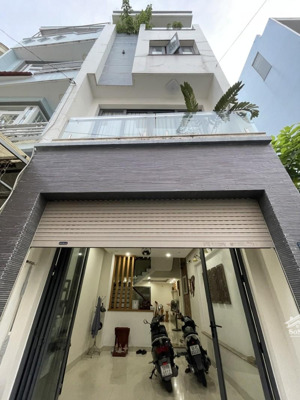 "hiếm" nhà đẹp 58m2 hẻm xe hơi, vị trí đắc địa, gần phạm văn đồng