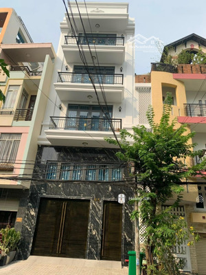 bán nhà mặt tiền lý phục man, quận 7 ( sổ hồng 6x20m ) trệt + 5 lầu, giá tốt đầu tư