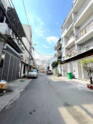 đường nhựa 10m đinh bộ lĩnh sát mặt tiền 70m2 __4 tầng đúc_ 6 phòng chdv_ bán đất tặng nhà_9,75 tỉ