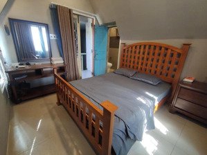 nhà vườn 2 lầu - 233m2 - cách biển 5km giá 2 tỷ xxx (x cấp 1)