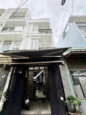 nhà đường nguyễn văn quá, hẻm xe hơi thông, 3 tầng, 4 phòng ngủ