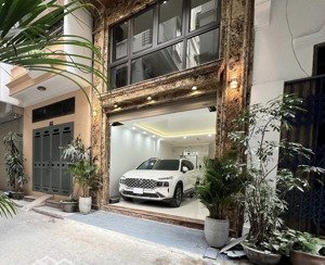 nhỉnh 21 tỏi có nhà đẹp 7 tầng phân lô - gara ô tô 7c - full nội thất sẵn ở đón tết sướng - cách ph