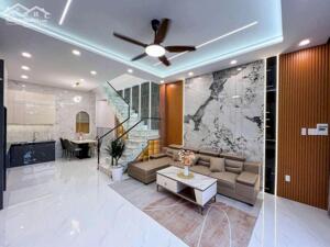 BÁN NHÀ 1 TRỆT 2 LẦU – MẶT TIỀN GẦN CHỢ RẠCH KIẾN