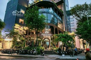 đối diện ks new world - mt phạm hồng thái, p. bt, q1 - dt 8 x 18m - 2 tầng - hđt 180tr - giá 80 tỷ