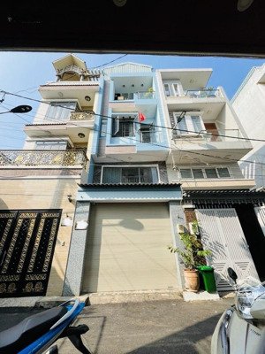 nhà 4tầng hoàng diệu 2 ngay vincom thủ đức đường xe hơi