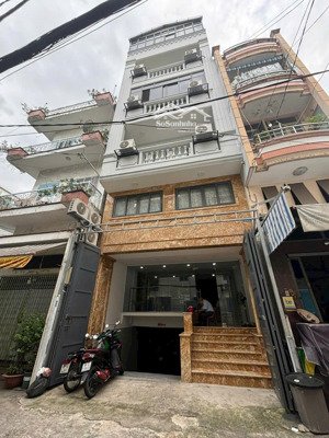 bán tòa nhà võ thị sáu trung tâm quận 3 - có thang máy - dòng tiền ổn định