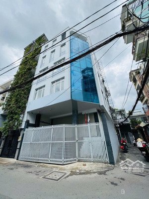 tòa nhà hầm 6 tầng, góc 2 mặt tiền đường phạm ngũ lão p3, gò vấp, dt 9x15m, 50 triệu 