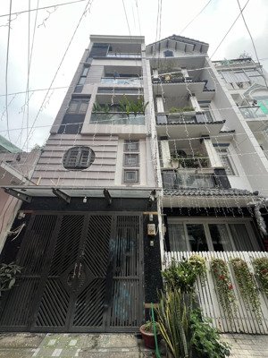 hxh 4m cách 1 căn ra trường sa nhà 5 tầng có gara oto 7 chỗ 4pn lớn chỉ 9.399 tỷ