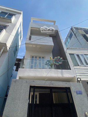 "hot" nhà phố đẹp 63m2, hẻm xe hơi, gần emart, phạm văn đồng