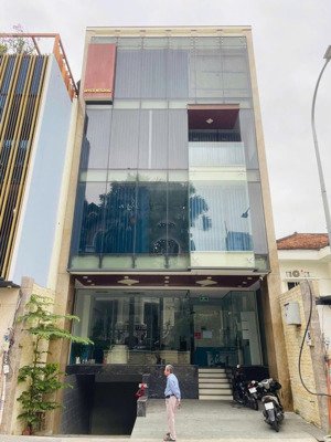 cho thuê toà nhà ốp kính mặt tiền trung tâm đakao, quận 1 - dt:8x15m - hầm 5 tầng - thang máy