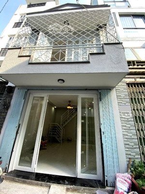 nhà phố 2 tầng, gần mặt tiền quang trung, lê văn thọ, hẻm xe hơi