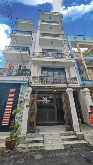 nhà 6 tầng thang máy (4,8x18m) 13 phòng 80tr/tháng. sát mặt tiền hoàng văn thụ - 18,5 tỷ