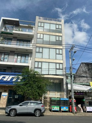 cc bán gấp! nhà mt 7x15m có 6 tầng ốp kính+thang máy. giá 39 tỷ/shr, phù hợp vận hành văn phòng cty