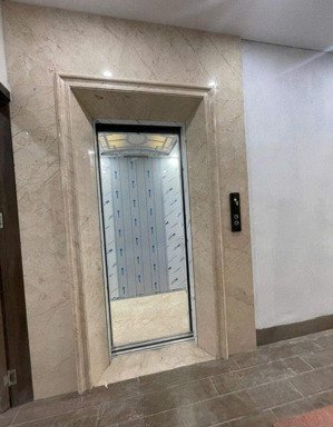 tôi cho thuê nhà hai mặt tiền,mới, thang máy, vỉa hè, 105m2- 4t, ngay giáp thái hà, chùa bộc_34 tr