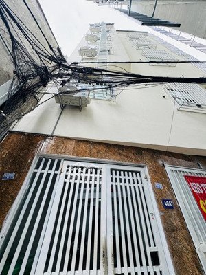 bán căn nhà 63 lê đức thọ dong tiền 80 triệu / 15 phòng 66m2 x 7 tầng thang máy giá bán 15 tỷ 5