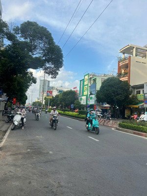 bán nhà hai mặt tiền đường lạc long quân , p5 , q11 , 4 x 20m , 4 lầu , 22 tỷ tl