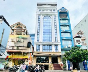 bán tòa nhà 8 tầng mặt phố nguyễn khang, gần ngã tư trần duy hưng, mặt tiền gần 7m, vỉa hè rộng