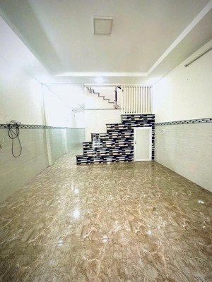 nhà mới 4*16m 1lầu 2pn 2wc hxh nguyễn phúc chu p15 tb