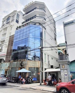 hạ 13 tỷ bán gấp building hầm 7 lầu góc 2mt trần nhật duật, q1, 8x16m, hđt cũ 320 triệu, chỉ 72 tỷ