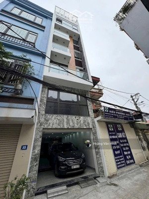 bán nhà 56m2 x 7 tầng gara 2 ô tô - thang máy - kinh doanh bất chấp - đường ô tô tránh - phố trạm