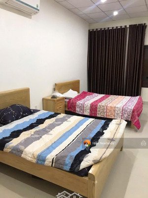 bán nhà 4 tầng mặt tiền đường trương văn hiến khu biển sơn thuỷ hiện có 9p cho thuê 20tr/th
