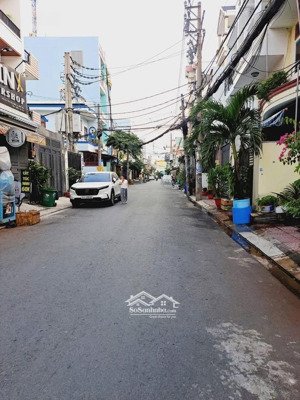 nguyễn thị thơi . hiệp thành q12 mặt tiền 3 tầng , (148m2) . ngang 8,5m . shr hoàn công .