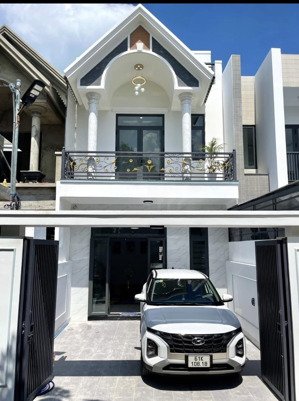 bán nhà phú mỹ thủ dầu một nhà thiết kế 3 phòng ngủ, mái đúc kiên cố sân đậu ô tô, đườn