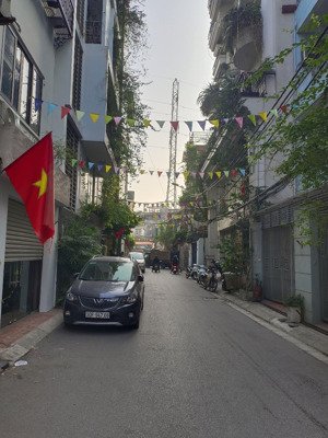 bán nhà hoàng quốc việt - 56m2 - mt 4.8m - phân lô - vỉa hè - ô tô tránh - ô chờ thang máy - 19,5t