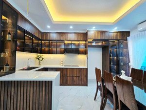 nhà lô góc 7 tầng, thang máy gara ôtô, thông sàn thiết kế luxury, phạm văn đồng, mai dịch