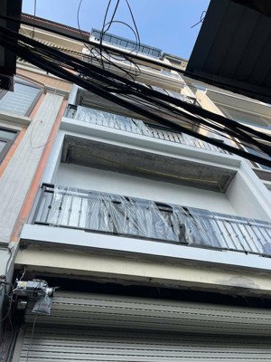 bán nhà ngay sau bến xe nước ngầm dt 50m x6 tầng ô tô đỗ vào nhà ,thang máy, giá 18 tỷ