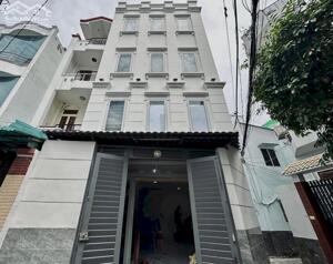 Ô TÔ NGỦ TRONG NHÀ, 5 Tầng 3PN 39m2 (5.2 x 7.5), P7 Bình Thạnh, giá 7.x ty