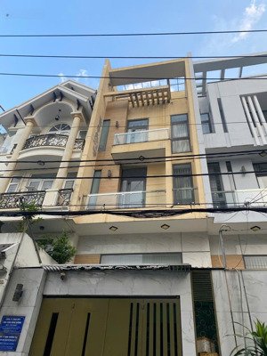 "gấp bán" nhà đẹp 4 tầng 54m2, hẻm rộng xe hơi, 4 phòng, gần phạm văn đồng